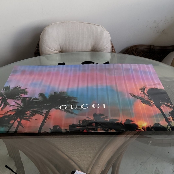 Gucci Handbags - Gucci store shopping bag as well as others...